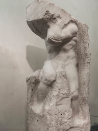 Michelangelo, Atlas prisoner, marble sculpture for Pope Julius II's Tomb, Accademia Gallery in Florence in Italy