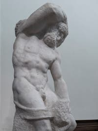 Michelangelo, Bearded Slave Prisoner, marble sculpture for Pope Julius II's Tomb, Accademia Gallery in Florence in Italy