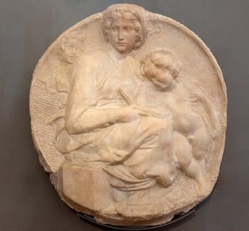 Michelangelo Buonarroti, Madonna and Child with Saint John as a Child, Pitti Tondo, Bargello Museum in Florence Italy