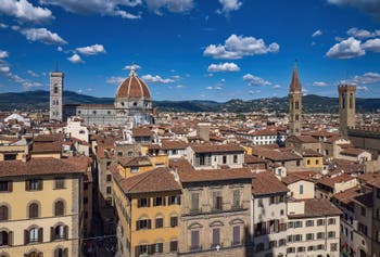 Giotto Bell Tower, the Duomo, the Badia Church and the Bargello in Florence in Italy, seen from the Palazzo Vecchio tower
