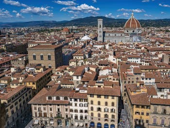 The Piazza della Signoria Square, the Giotto Bell Tower and the Duomo, seen from the Palazzo Vecchio Tower in Florence in Italy